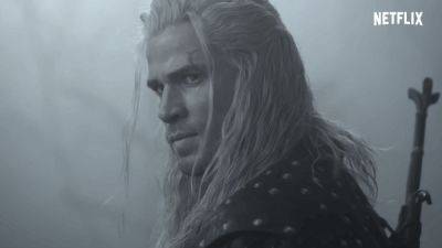 Andy Chalk - Henry Cavill - Liam Hemsworth - Netflix finally reveals Liam Hemsworth as Geralt in The Witcher season 4, and I think he looks pretty good - pcgamer.com - Looks